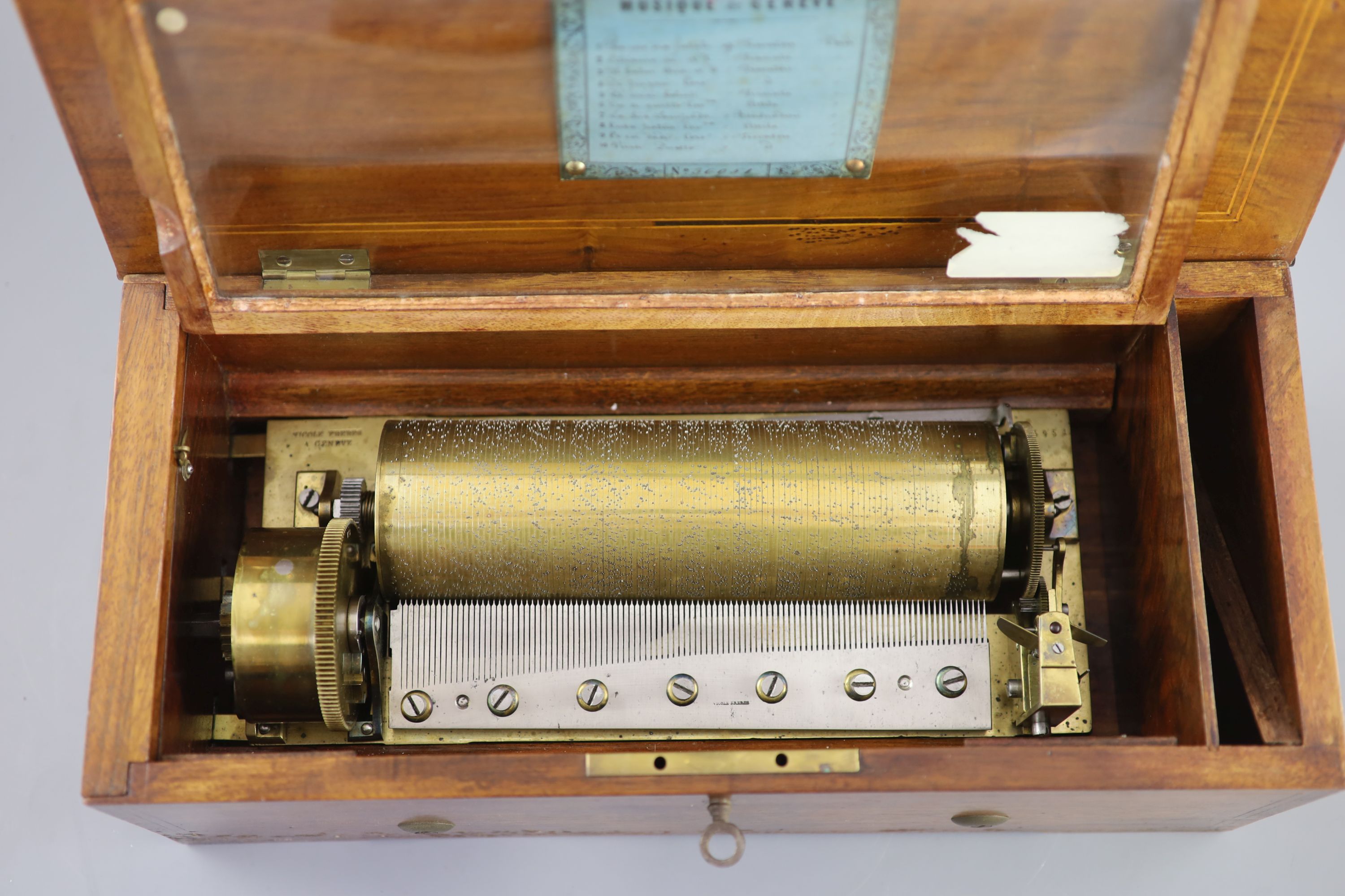 Nicole Freres, Swiss mahogany cased and rosewood veneered cylinder music box, 19th century 44cm wide, 20cm deep, 16cm.